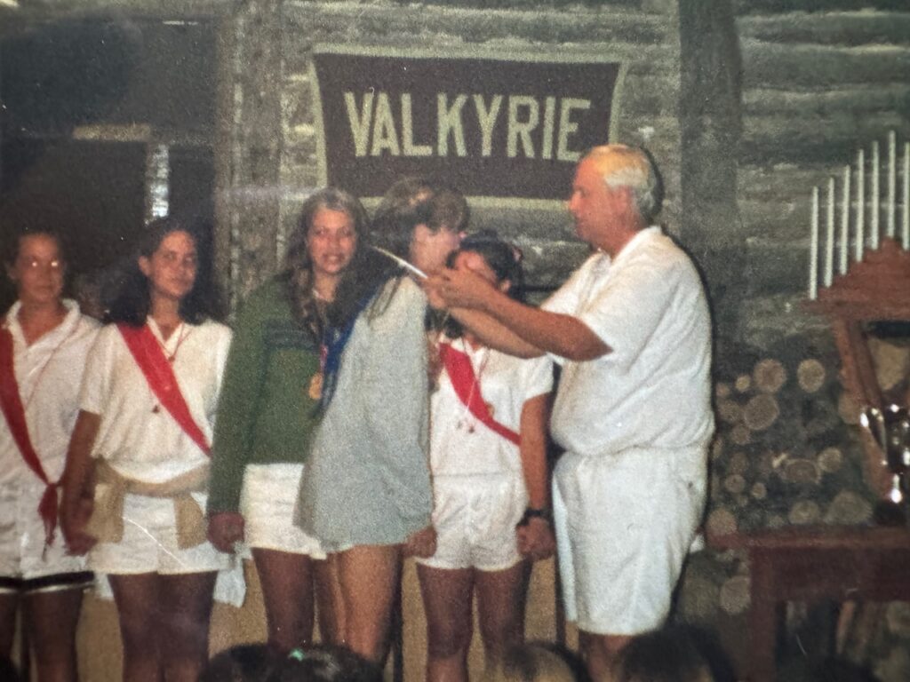 Emily receiving the Riflery medal in 2000