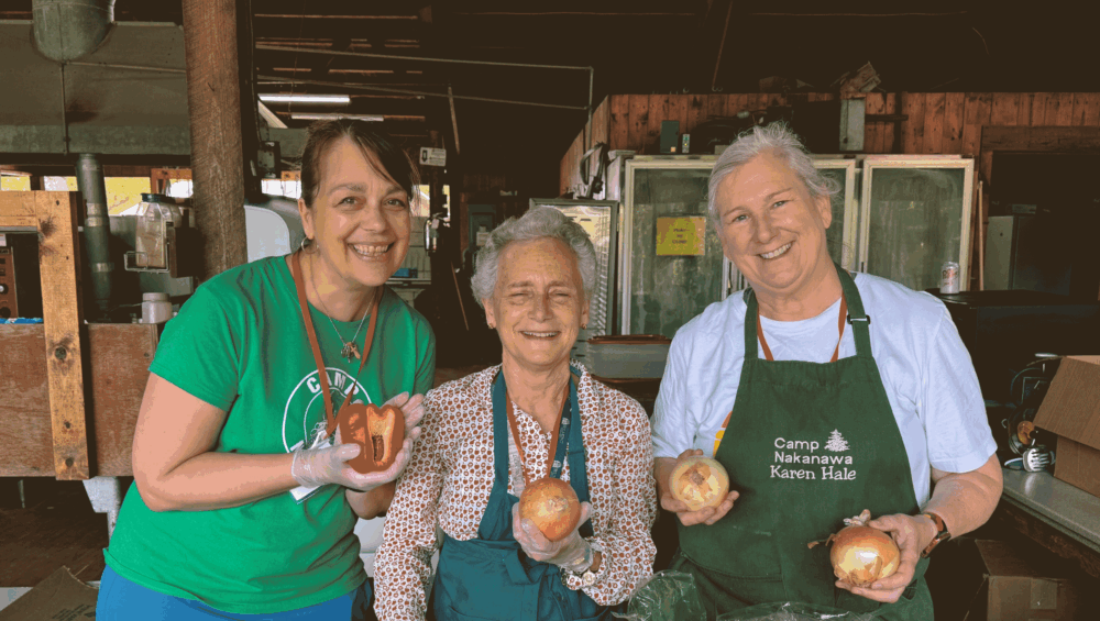 Alex, Wyeth, and Karen prep food for Service Weekend 2025.